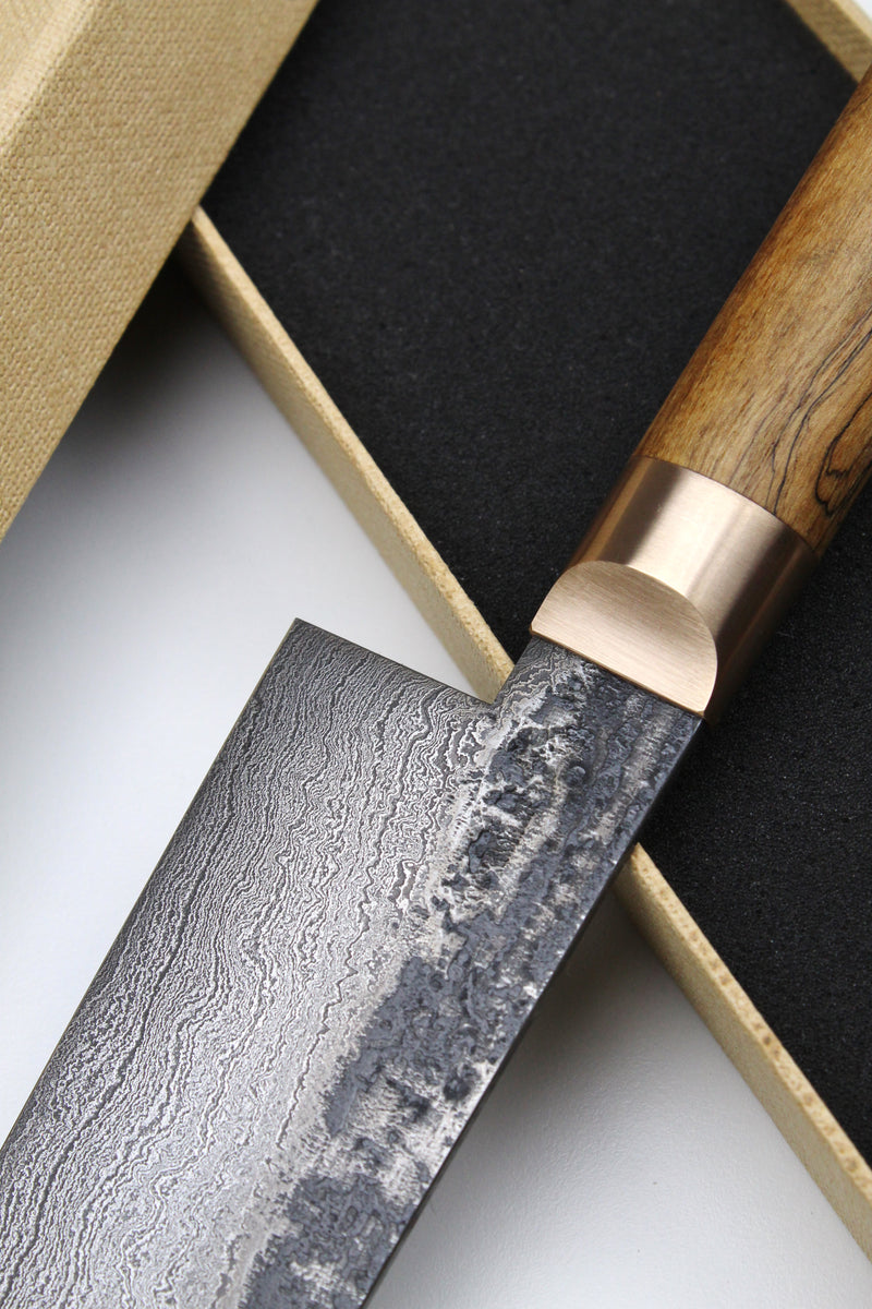Damascus Santoku 500L Oval